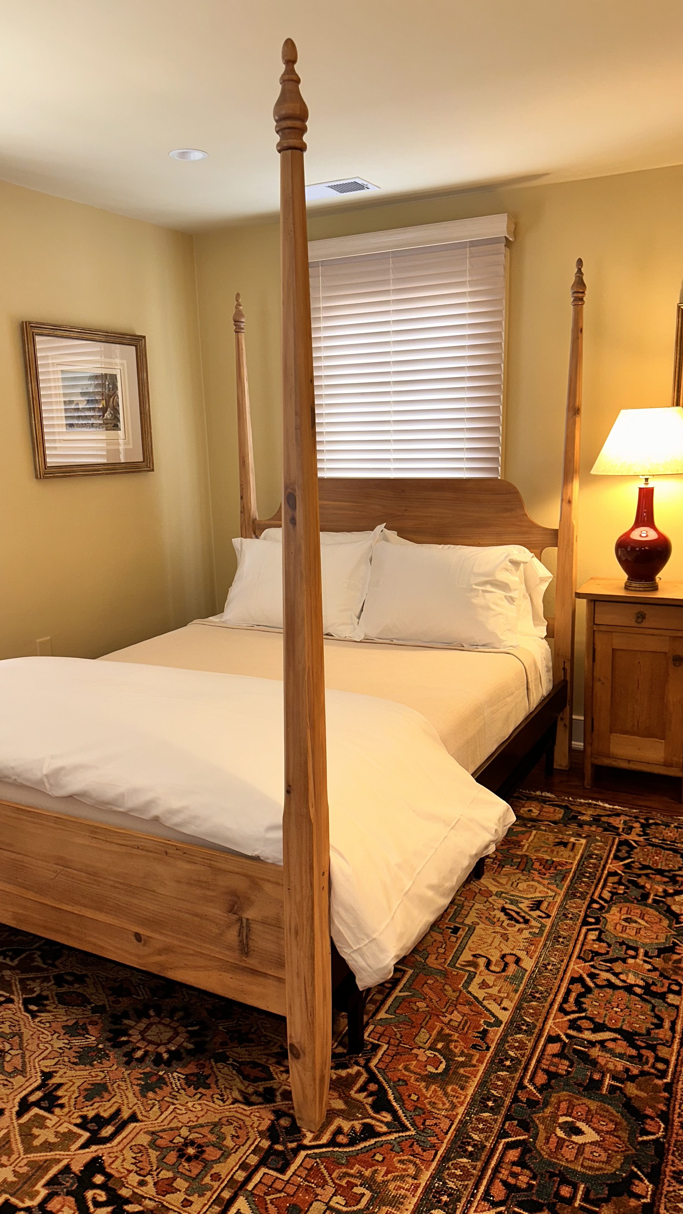 Queen-sized pine pencil-post bed