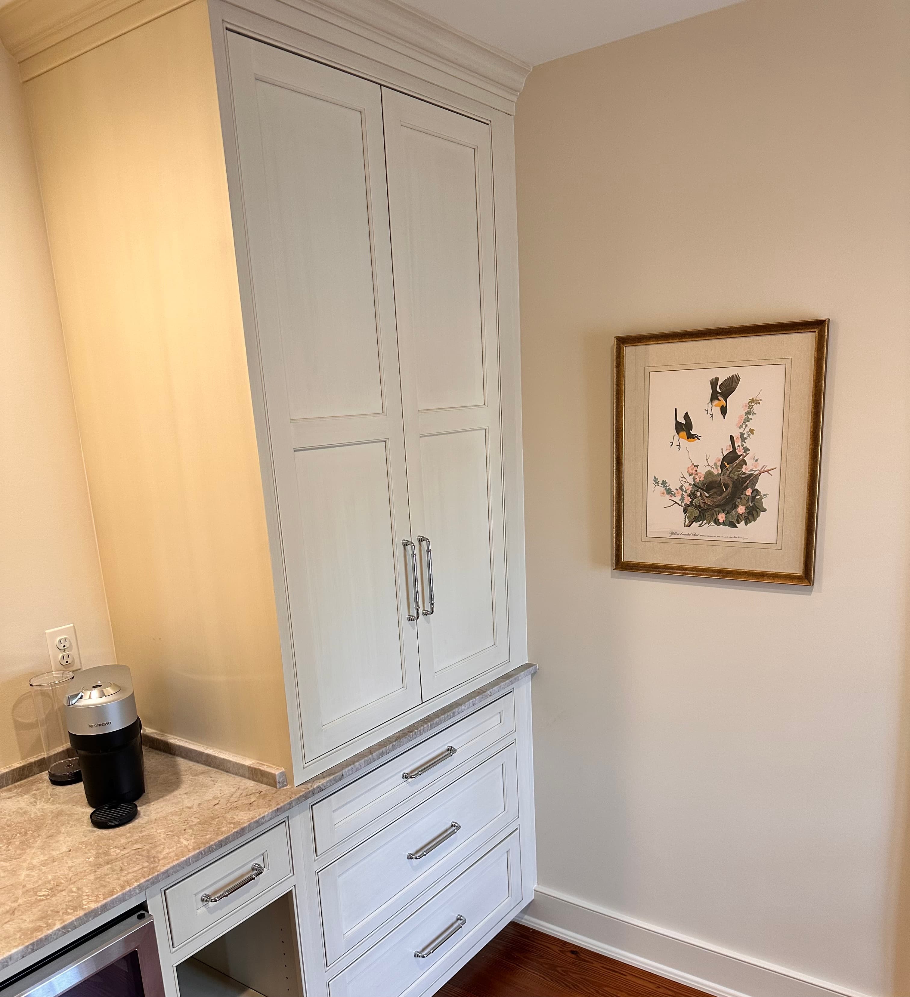 hospitality bar with Nespresso machine and closet for hanging garments