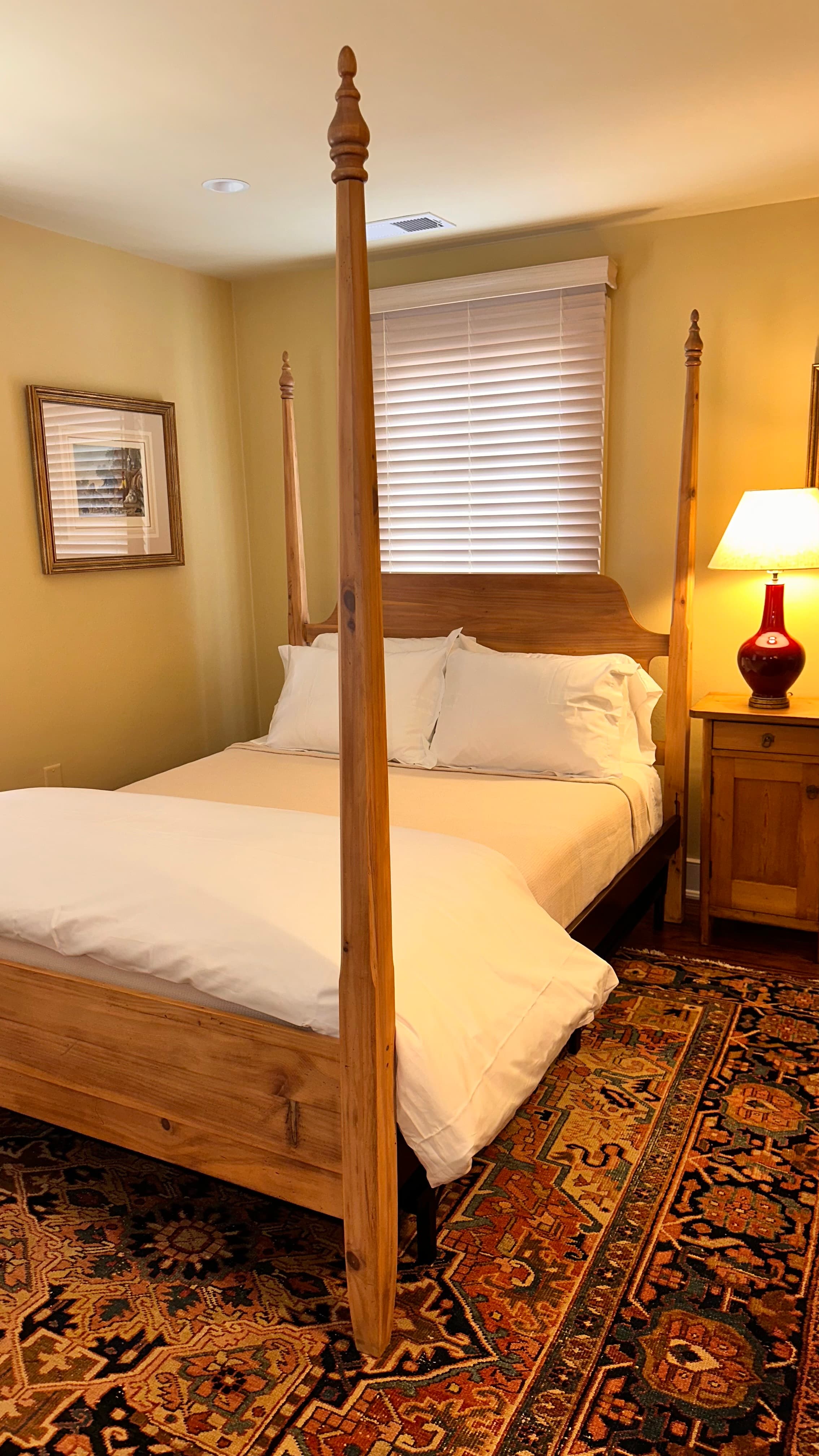 Queen-sized pine pencil-post bed